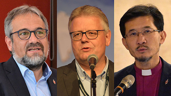 Das Bild zeigt drei evangelisch-methodistische Bischöfe. Links: Harald Rückert, grauschwarze Haare, Brille und Vollbart; Mitte: Christian Alsted, helle Haare und Brille; daneben Eduard Khegay, schwarze Haare, Brille und Bart um die Mundpartie.